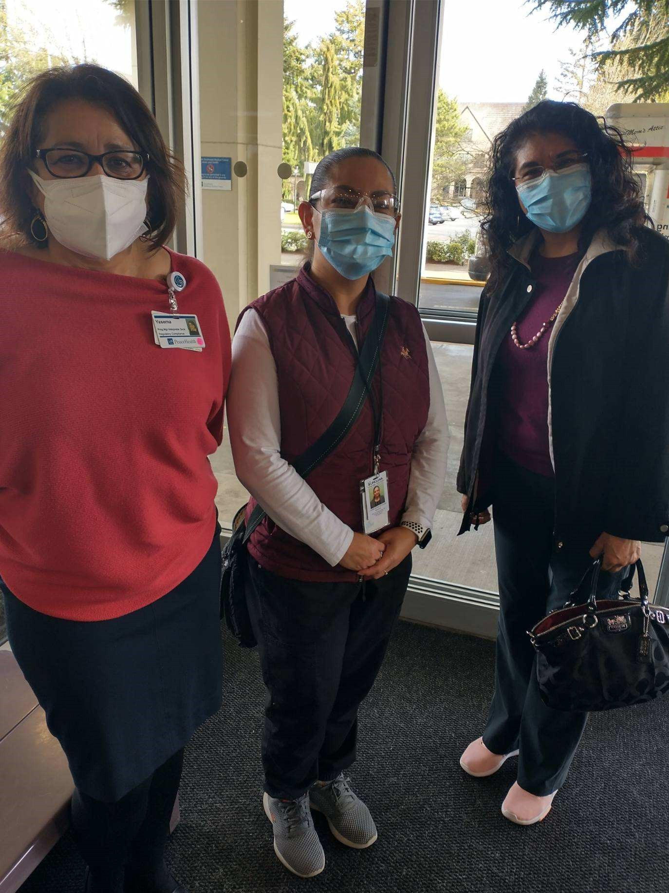 Women in masks at Odyssey World International Education Services