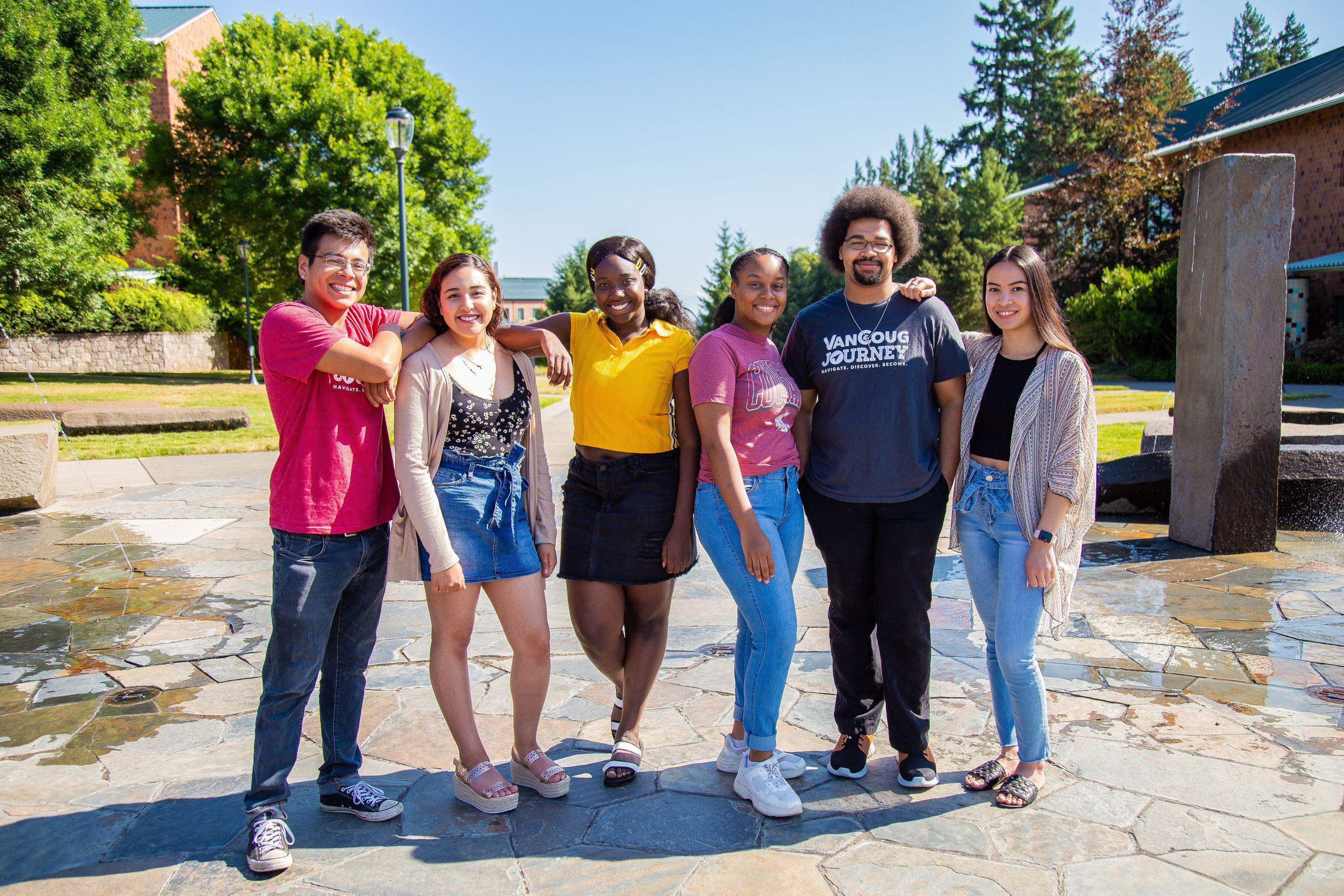 A group of diverse students standing on campus at Lower Columbia College in Longview, WA