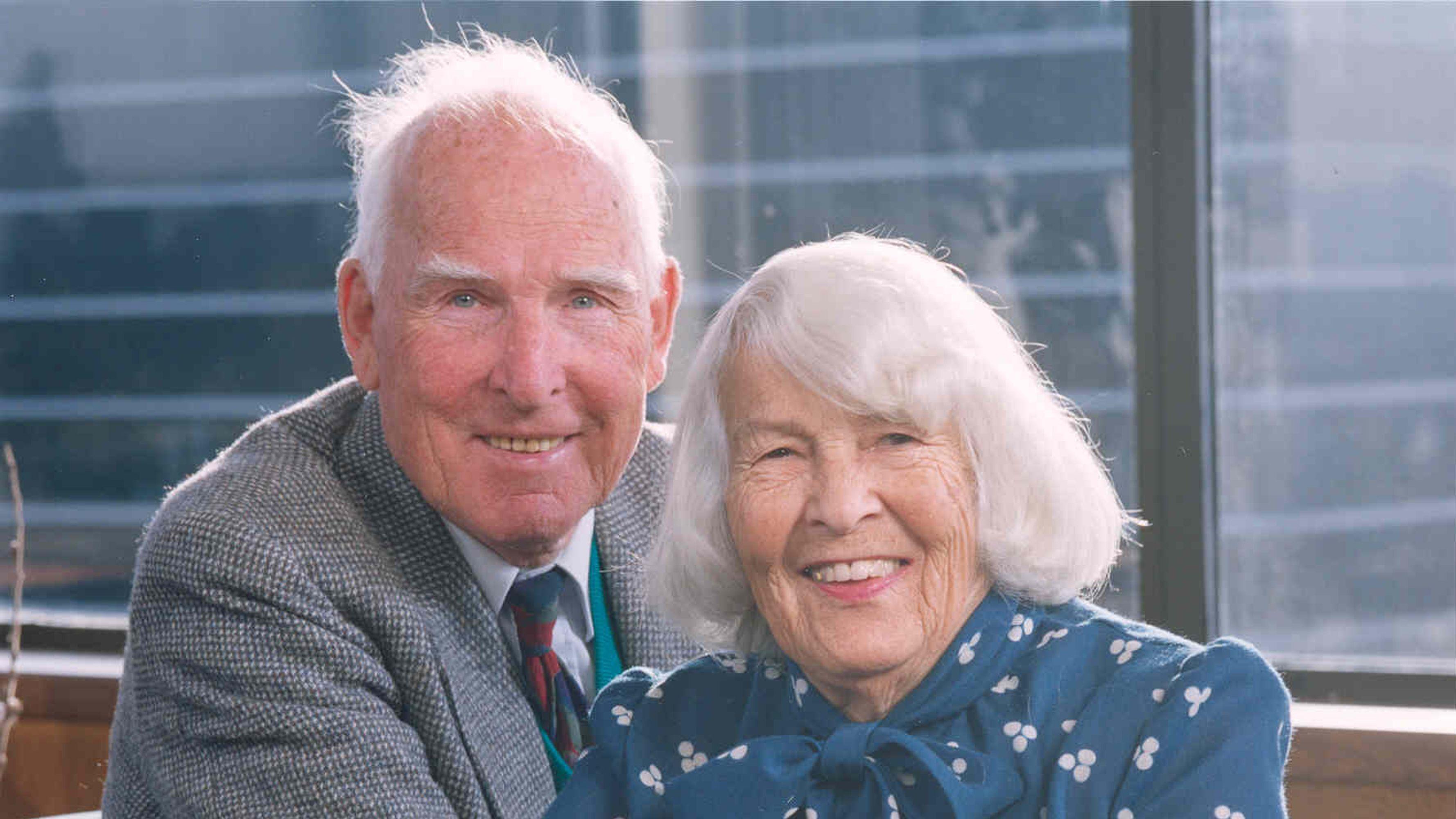 E.W. and Mary Firstenburg sitting next to each other smiling