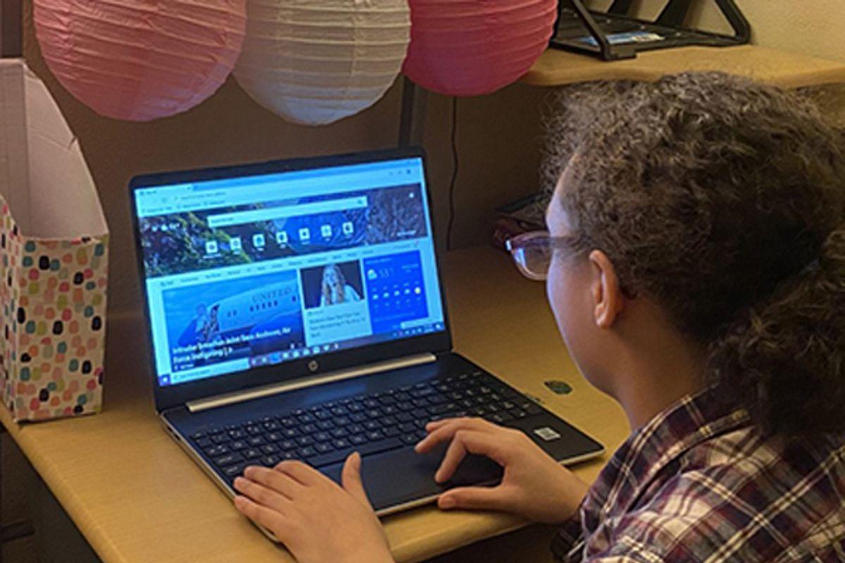 A student working on their laptop at a desk at iUrban Teen in Vancouver, Washington